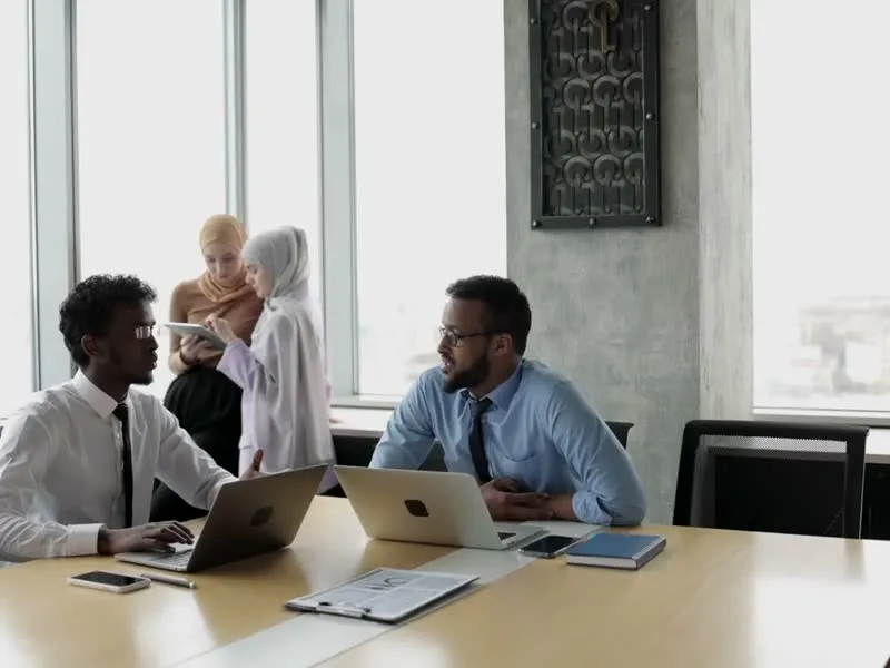 A finance team reviewing the month together