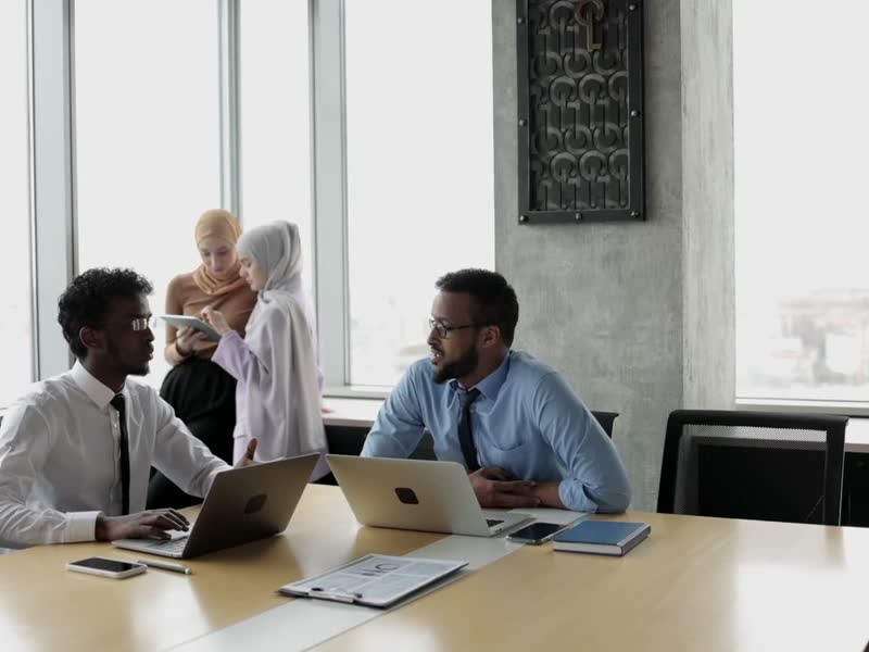 A finance team reviewing the month together